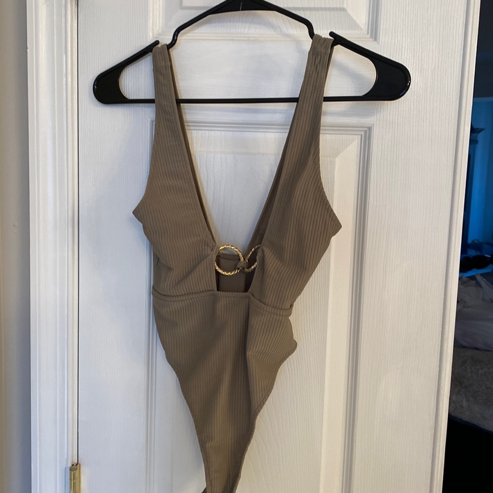 Cute green with gold ring bodysuit